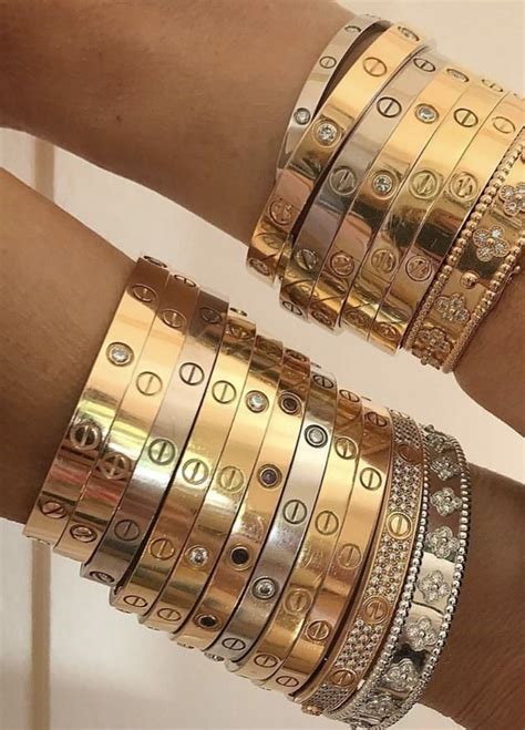 two cartier love bracelet stack